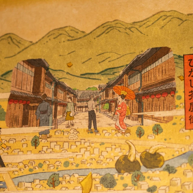 浮世絵風ウォールアートを望むテーブル席