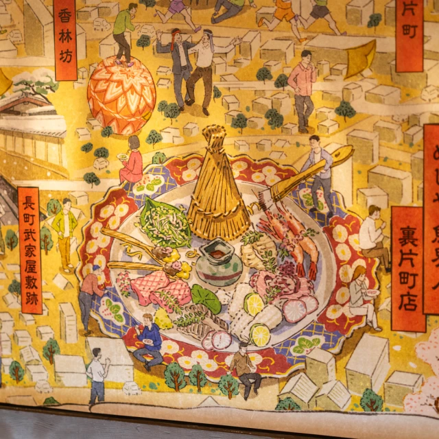 浮世絵風ウォールアートを望むテーブル席