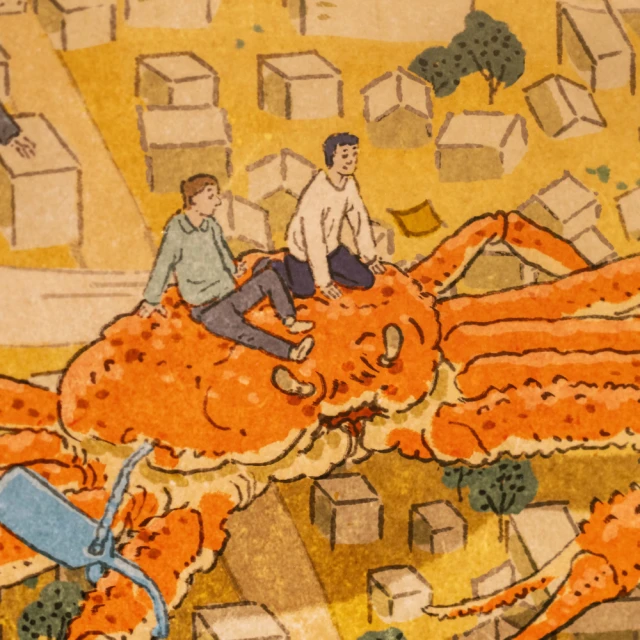 浮世絵風ウォールアートを望むテーブル席