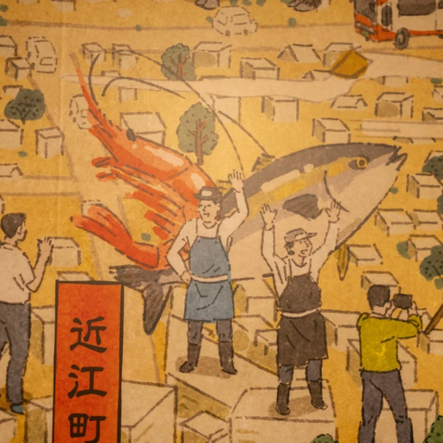浮世絵風ウォールアートを望むテーブル席